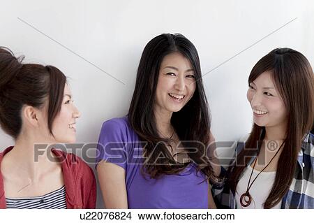 Picture - Three women talking. Fotosearch