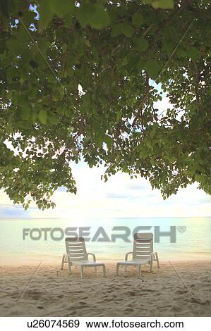 Stock Photo - Two Chairs on Beach. Fotosearch