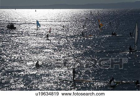 Stock Photo - Windsurfers at sea, Kanagawa Prefecture, Honshu, Japan. Fotosearch
