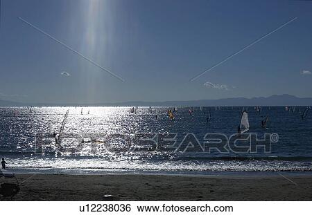 Windsurfers at sea, Kanagawa Prefecture, Honshu, Japan View Large Photo Image Stock Photograph - Windsurfers at sea, Kanagawa Prefecture, Honshu, Japan. Fotosearch