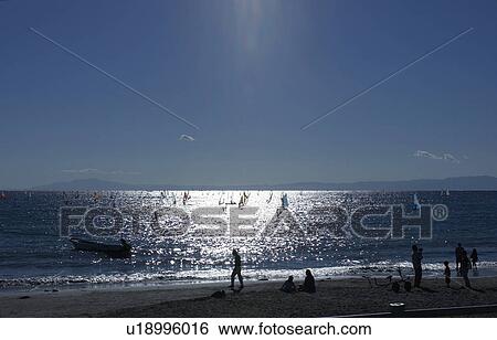 Stock Photograph - Windsurfers at sea, Kanagawa Prefecture, Honshu, Japan. Fotosearch