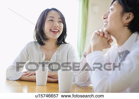 Young Couple Chatting Over Cup of Coffee View Large Photo Image Stock Photo - Young Couple Chatting Over Cup of Coffee. Fotosearch