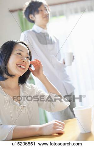 Stock Image - Young Couple Having Afternoon Break. Fotosearch