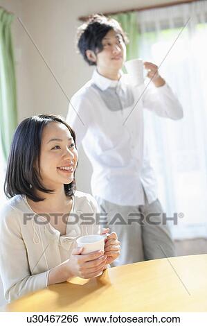 Young Couple Having Afternoon Break View Large Photo Image Stock Photograph - Young Couple Having Afternoon Break. Fotosearch