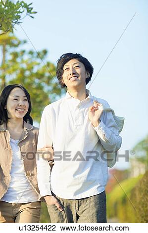 Young Couple Walking View Large Photo Image Stock Image - Young Couple Walking. Fotosearch