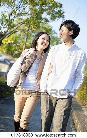 Young Couple Walking View Large Photo Image Stock Image - Young Couple Walking. Fotosearch