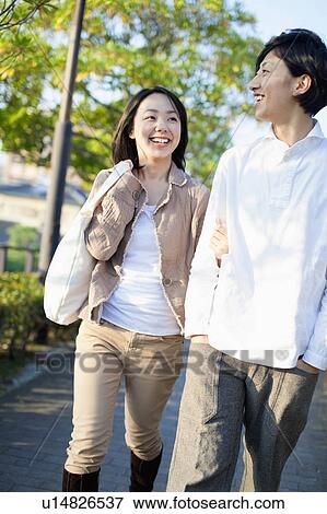 Young Couple Walking View Large Photo Image Stock Photo - Young Couple Walking. Fotosearch