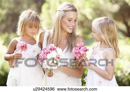 Bride With Bridesmaids Outdoors At Wedding View Large Photo Image Stock Photograph - Bride With Bridesmaids Outdoors At Wedding. Fotosearch