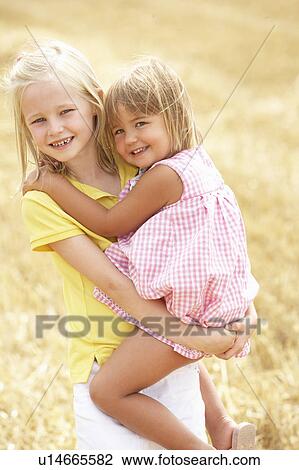 Children Having Fun In Summer Harvested Field View Large Photo Image Stock Image - Children Having Fun In Summer Harvested Field. Fotosearch
