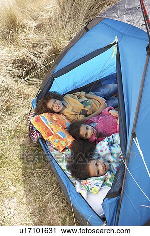 Children Having Fun Inside Tent On Camping Holiday View Large Photo Image Stock Image - Children Having Fun Inside Tent On Camping Holiday. Fotosearch