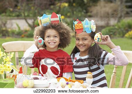 Children Painting Easter Eggs In Gardens View Large Photo Image Stock Image - Children Painting Easter Eggs In Gardens. Fotosearch