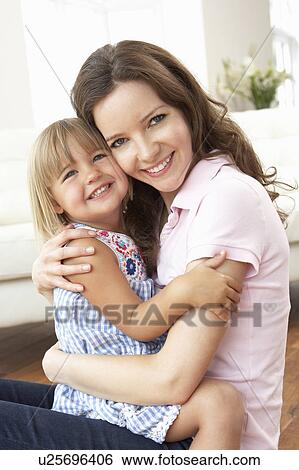 Close Up Of Affectionate Mother And Daughter At Home View Large Photo Image Stock Photograph - Close Up Of Affectionate Mother And Daughter At Home. Fotosearch