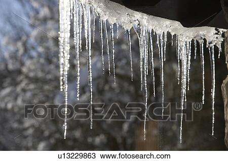 Close Up Of Icicles Hanging From Roof View Large Photo Image Stock Image - Close Up Of Icicles Hanging From Roof. Fotosearch
