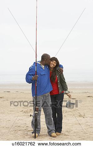 Couple Fishing On Beach View Large Photo Image Stock Image - Couple Fishing On Beach. Fotosearch