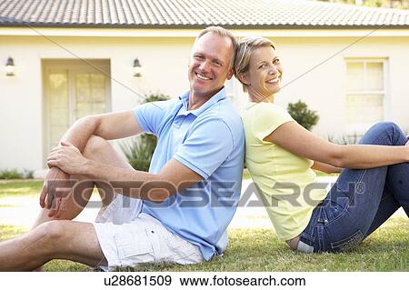 Couple Sitting Outside Dream Home View Large Photo Image Stock Photo - Couple Sitting Outside Dream Home. Fotosearch