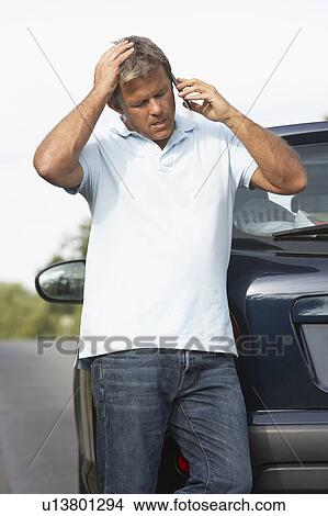 Picture - Driver Broken Down On Country Road. Fotosearch
