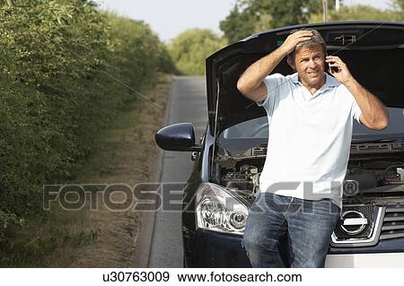 Driver Broken Down On Country Road View Large Photo Image Stock Photo - Driver Broken Down On Country Road. Fotosearch