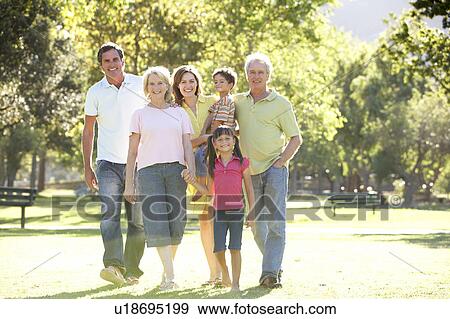 Extended Group Portrait Of Family Enjoying Walk In Park View Large Photo Image Stock Photo - Extended Group Portrait Of Family Enjoying Walk In Park. Fotosearch