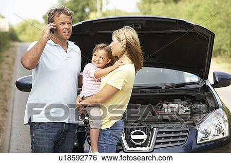 Stock Photograph - Family Broken Down On Country Road. Fotosearch