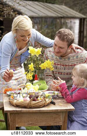 Family Decorating Easter Eggs On Table Outdoors View Large Photo Image Stock Image - Family Decorating Easter Eggs On Table Outdoors . Fotosearch