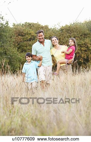Family Enjoying Walk In Park View Large Photo Image Stock Photo - Family Enjoying Walk In Park. Fotosearch