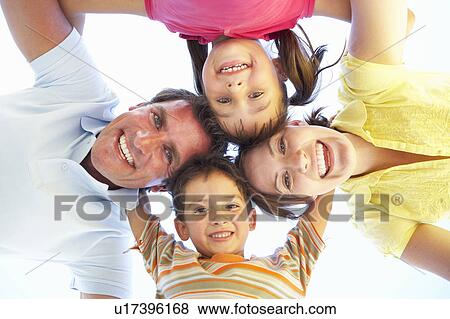 Family Group Looking Down Into Camera View Large Photo Image Stock Photo - Family Group Looking Down Into Camera. Fotosearch