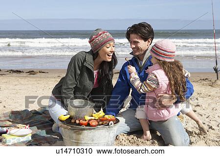 Family Having Barbeque On Winter Beach View Large Photo Image Stock Image - Family Having Barbeque On Winter Beach. Fotosearch