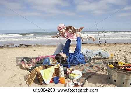 Family Having Barbeque On Winter Beach View Large Photo Image Stock Image - Family Having Barbeque On Winter Beach. Fotosearch
