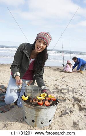 Family Having Barbeque On Winter Beach View Large Photo Image Stock Photo - Family Having Barbeque On Winter Beach. Fotosearch