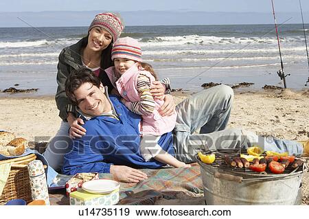 Family Having Barbeque On Winter Beach View Large Photo Image Stock Photo - Family Having Barbeque On Winter Beach. Fotosearch