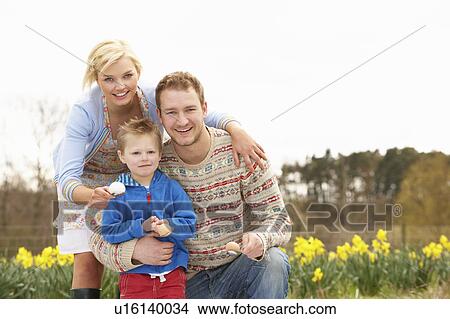 Picture - Family Having Egg And Spoon Race. Fotosearch