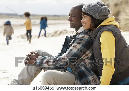 Family Having Fun On Winter Beach View Large Photo Image Stock Photography - Family Having Fun On Winter Beach. Fotosearch