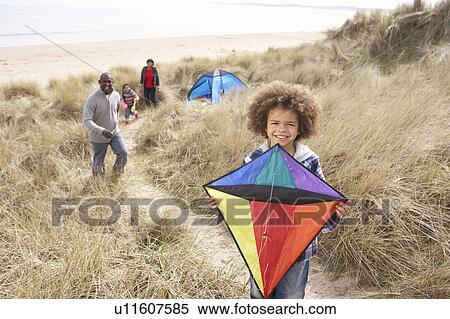 Family Having Fun With Kite In Sand Dunes View Large Photo Image Stock Photography - Family Having Fun With Kite In Sand Dunes. Fotosearch