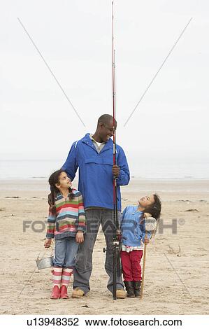 Family On Beach Fishing Trip View Large Photo Image Stock Image - Family On Beach Fishing Trip. Fotosearch