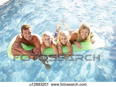 Family Outside Relaxing In Swimming Pool View Large Photo Image Stock Image - Family Outside Relaxing In Swimming Pool. Fotosearch