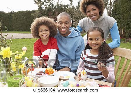 Family Painting Easter Eggs In Gardens View Large Photo Image Picture - Family Painting Easter Eggs In Gardens. Fotosearch