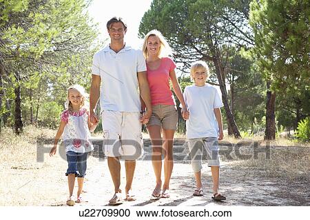 Family, parents and children, walking, walk together in park View Large Photo Image Stock Image - Family, parents and children, walking, walk together in park. Fotosearch