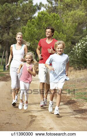 Family running on path in park View Large Photo Image Stock Image - Family running on path in park. Fotosearch
