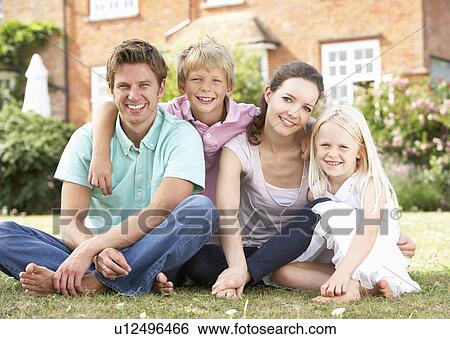 Stock Photograph - Family Sitting In Garden Together. Fotosearch