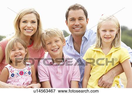 Family Sitting On Straw Bales In Harvested Field View Large Photo Image Stock Photo - Family Sitting On Straw Bales In Harvested Field. Fotosearch