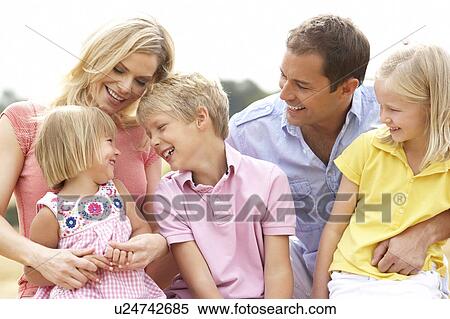 Family Sitting On Straw Bales In Harvested Field View Large Photo Image Stock Photography - Family Sitting On Straw Bales In Harvested Field. Fotosearch