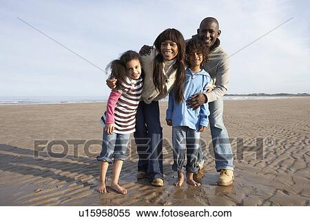 Family Walking On Winter Beach View Large Photo Image Stock Photography - Family Walking On Winter Beach. Fotosearch