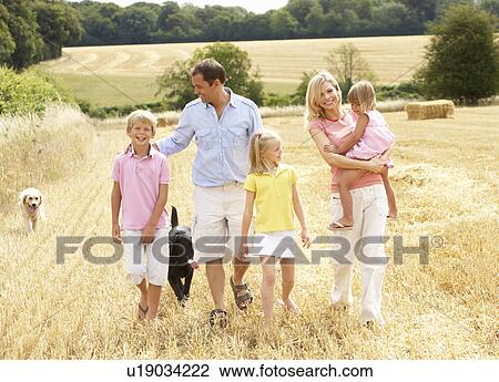 Family Walking Together Through Summer Harvested Field View Large Photo Image Stock Image - Family Walking Together Through Summer Harvested Field. Fotosearch
