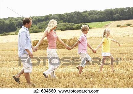 Family Walking Together Through Summer Harvested Field View Large Photo Image Stock Image - Family Walking Together Through Summer Harvested Field. Fotosearch