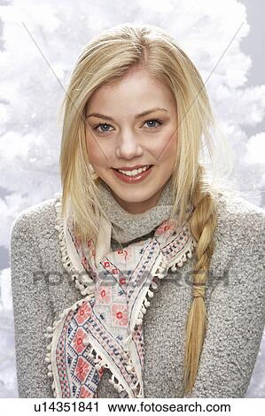 Fashionable Teenage Girl Wearing Cap And Knitwear In Studio In Front Of Christmas Tree View Large Photo Image Stock Image - Fashionable Teenage Girl Wearing Cap And Knitwear In Studio In Front Of Christmas Tree. Fotosearch