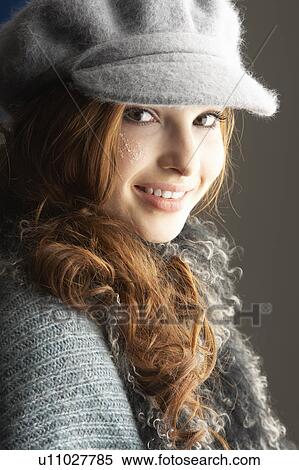 Fashionable Teenage Girl Wearing Cap And Knitwear In Studio View Large Photo Image Stock Photography - Fashionable Teenage Girl Wearing Cap And Knitwear In Studio. Fotosearch