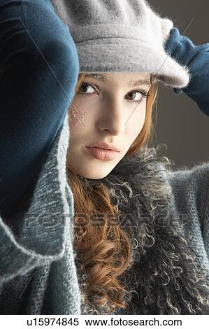 Fashionable Teenage Girl Wearing Cap And Knitwear In Studio View Large Photo Image Stock Photography - Fashionable Teenage Girl Wearing Cap And Knitwear In Studio. Fotosearch