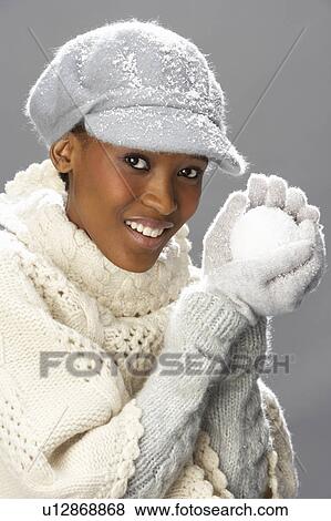 Fashionable Woman Wearing Knitwear And Cap In Studio View Large Photo Image Stock Photo - Fashionable Woman Wearing Knitwear And Cap In Studio. Fotosearch