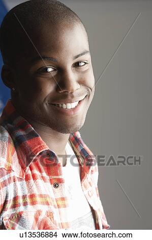 Picture - Fashionable Young Man Wearing Casual Clothes In Studio. Fotosearch