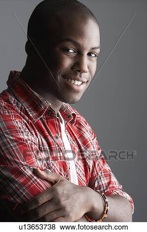 Fashionable Young Man Wearing Casual Clothes In Studio View Large Photo Image Stock Photo - Fashionable Young Man Wearing Casual Clothes In Studio. Fotosearch